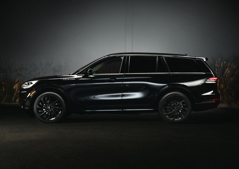 A 2024 Lincoln Aviator® SUV is shown in the Infinite Black exterior color | Parks Lincoln of Tampa in Tampa FL