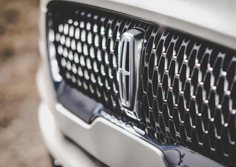 The grille of the 2024 Lincoln Aviator® Reserve model with an eye-catching repeated field of Lincoln Star logo shapes | Parks Lincoln of Tampa in Tampa FL