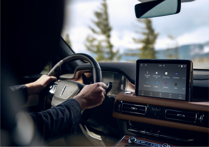 The Lincoln+Alexa app screen is displayed in the center screen of a 2023 Lincoln Aviator® Grand Touring SUV | Parks Lincoln of Tampa in Tampa FL