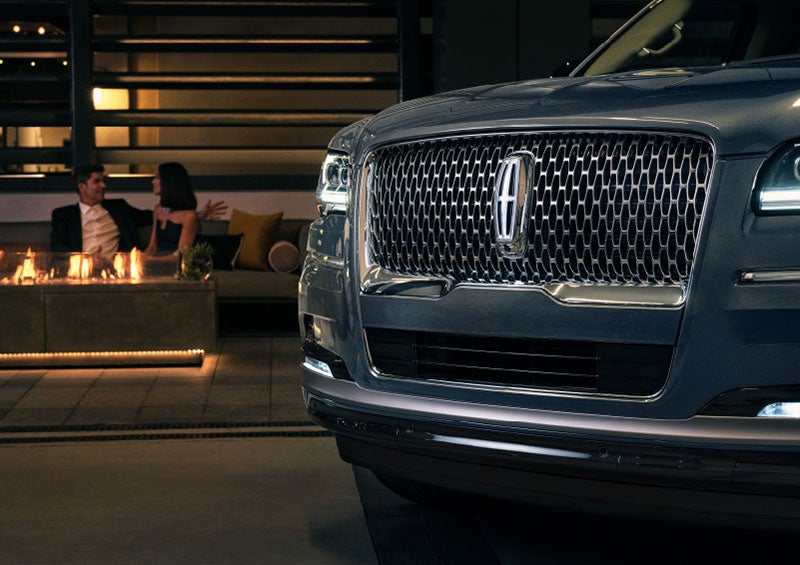 The front grille of a 2023 Lincoln Navigator® SUV is elegantly illuminated. | Parks Lincoln of Tampa in Tampa FL