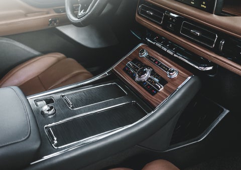 The front center console of a 2024 Lincoln Aviator® SUV is shown | Parks Lincoln of Tampa in Tampa FL