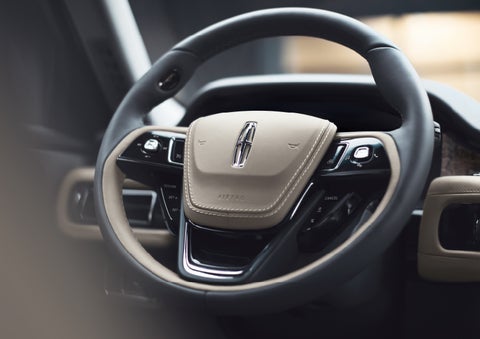 The intuitively placed controls of the steering wheel on a 2024 Lincoln Aviator® SUV | Parks Lincoln of Tampa in Tampa FL