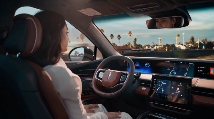 A person is shown driving hands-free on the highway with available Lincoln BlueCruise technology. | Parks Lincoln of Tampa in Tampa FL