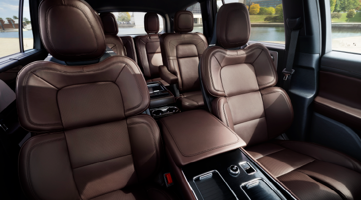 The cabin of the 2025 Lincoln Aviator® SUV is shown with black and brown accents. | Parks Lincoln of Tampa in Tampa FL
