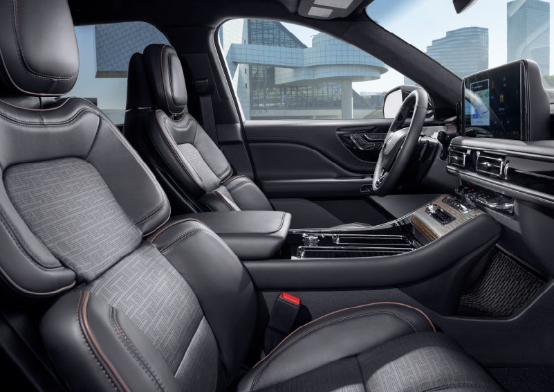 The interior of the 2025 Lincoln Aviator® SUV is shown with sleek black accents. | Parks Lincoln of Tampa in Tampa FL