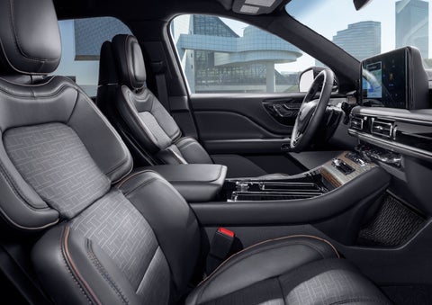 The interior of the 2025 Lincoln Aviator® SUV is shown with sleek black accents. | Parks Lincoln of Tampa in Tampa FL