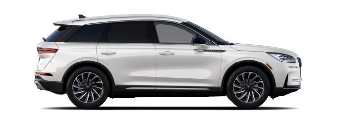 The passenger side of a Lincoln Corsair® SUV is shown in the Ceramic Pearl extra-cost exterior paint option. | Parks Lincoln of Tampa in Tampa FL