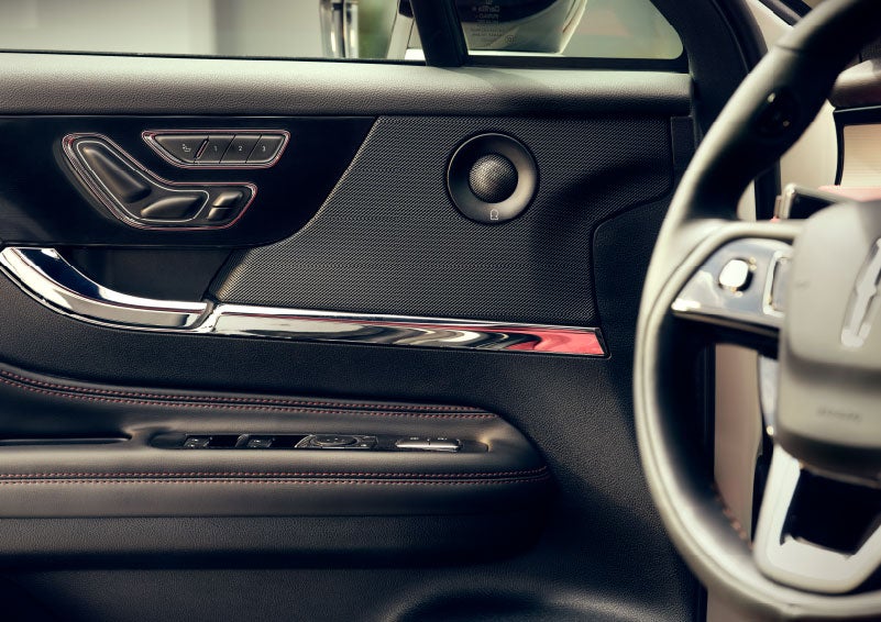 An audio speaker is shown in the driver's side door of a 2024 Lincoln Corsair® SUV. | Parks Lincoln of Tampa in Tampa FL