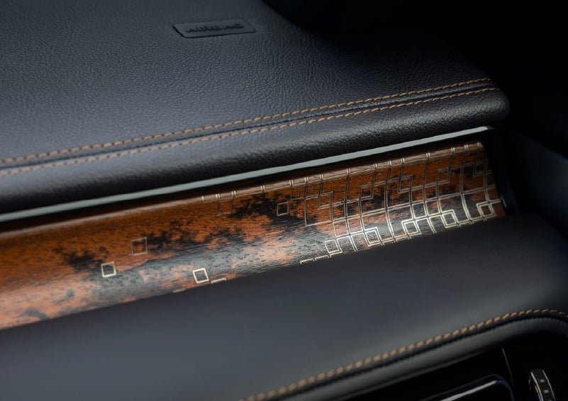 A close-up shot of the 2026 Lincoln Aviator® dashboard with unique black and brown accents and brown stitching. | Parks Lincoln of Tampa in Tampa FL