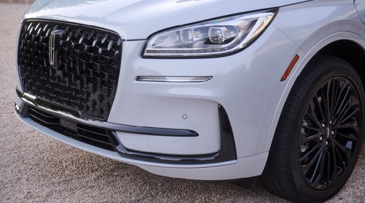 The all-black grille of the available Jet Appearance Package on a 2026 Lincoln Corsair® SUV is shown. | Parks Lincoln of Tampa in Tampa FL