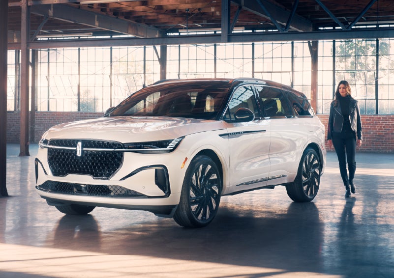 A person approaches a 2026 Lincoln Nautilus® SUV. | Parks Lincoln of Tampa in Tampa FL