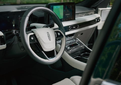 The leather-trimmed steering wheel of a 2027 Lincoln Aviator® Black Label™ SUV. | Parks Lincoln of Tampa in Tampa FL
